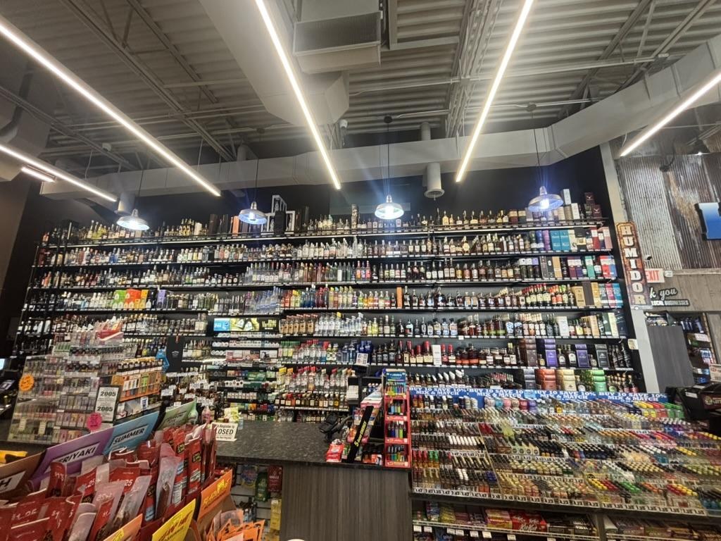 Vapes and nicotine pouches behind the counter — Zyn, On!, Velo, Rogue