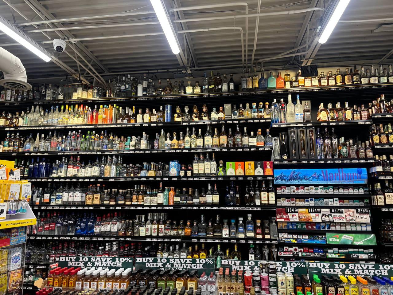 The Liquor Wall — allocated bourbon, rare bottles, and the deepest spirits selection in the region